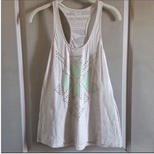 Express tank top. Geometric top with studs and sheer back. Worn once.